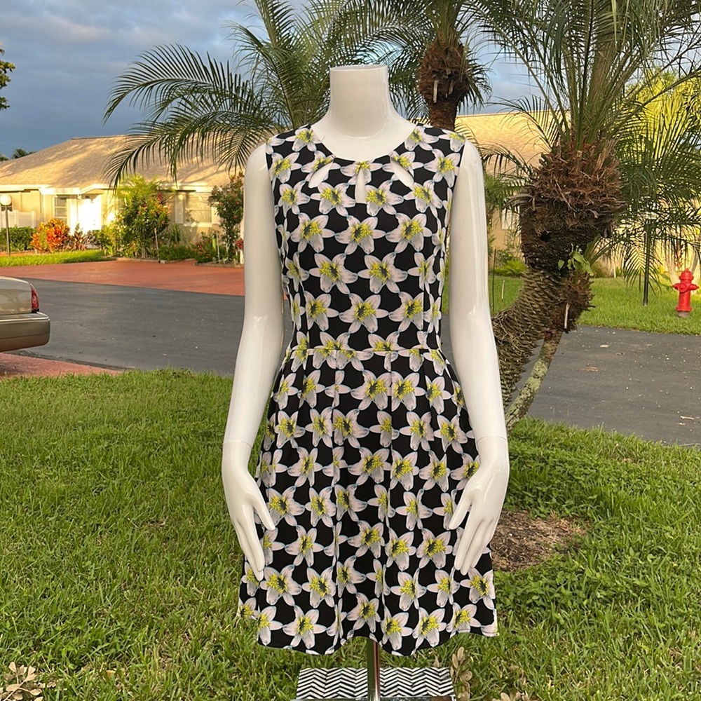 Floral dress with peak a boo detail